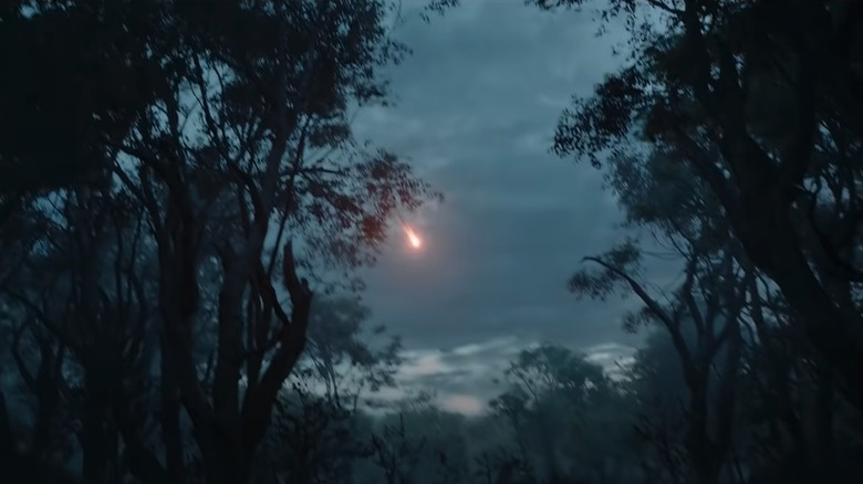 A fireball streaks across the sky