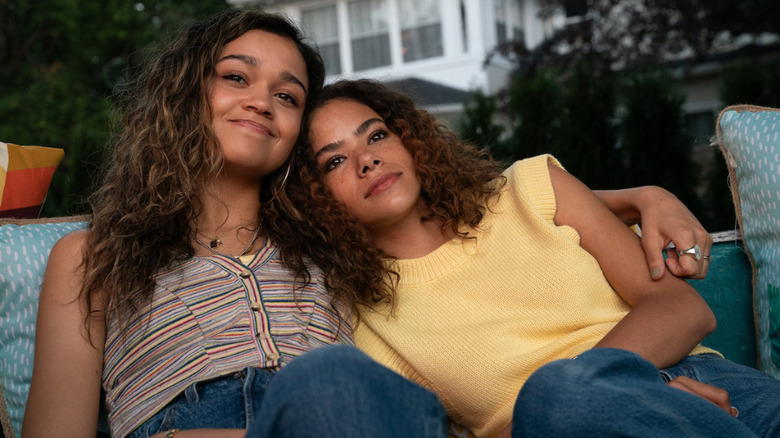 Lucy and Summer happily holding each other