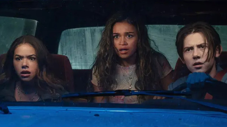 Summer, Lucy, and Quinn in car, scared