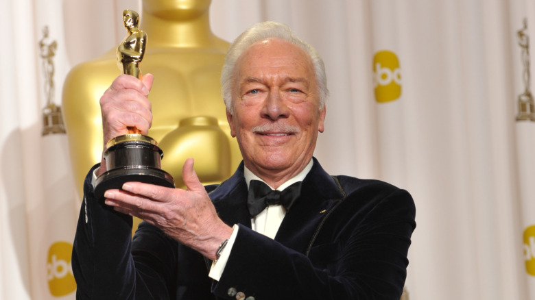 Christopher Plummer holding an Oscar