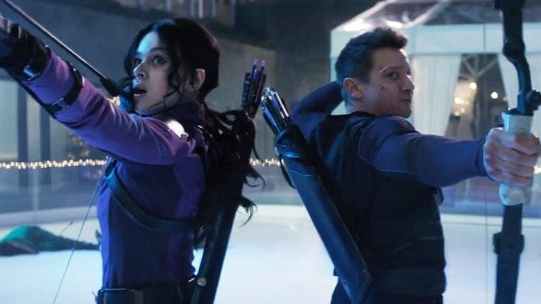 Kate Bishop and Clint Barton draw their bows