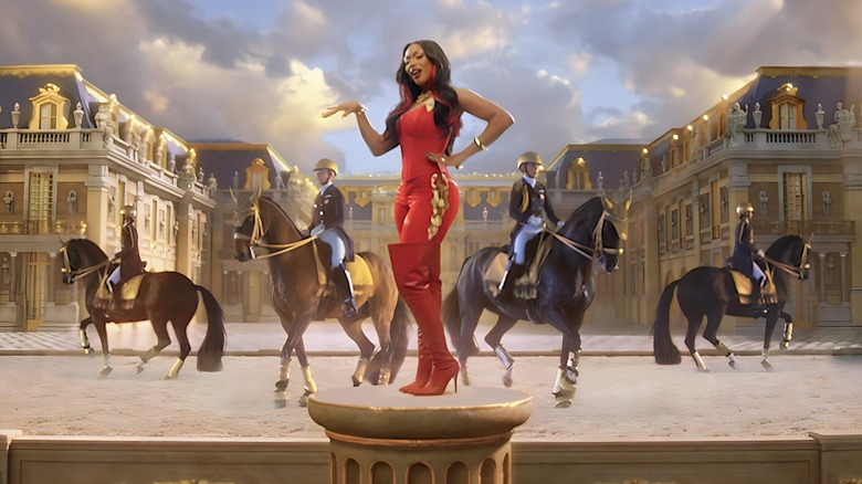 Megan Thee Stallion standing horses