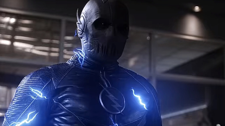 Zoom stands ominously with blue lightning crackling on The Flash (2014-2023)