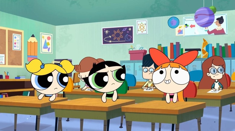 Bubbles and Buttercup look at a smiling, wide-eyed Blossom on The PowerPuff Girls