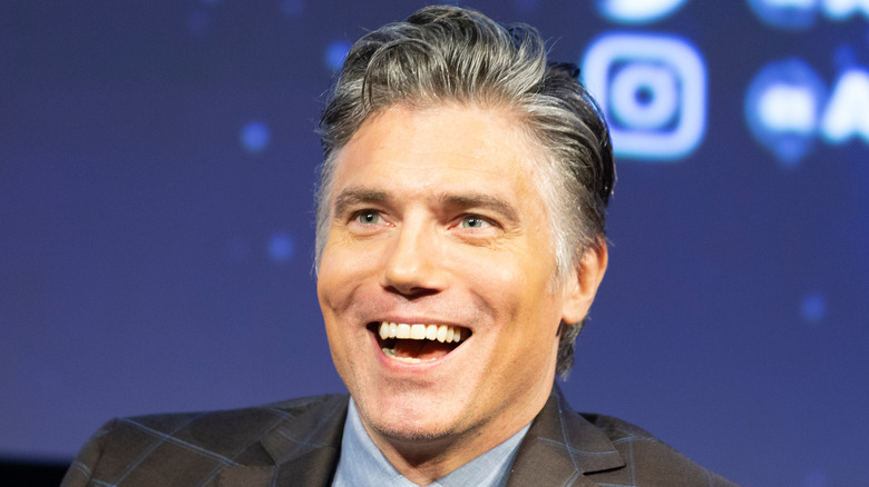 Anson Mount grinning broadly 