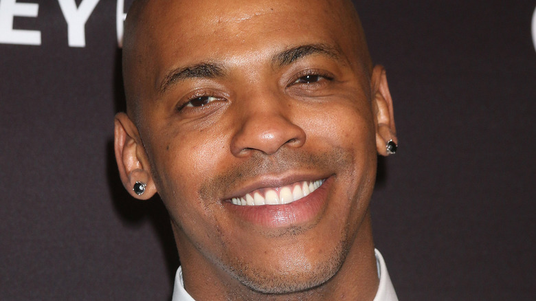 Mehcad Brooks smiling at an event