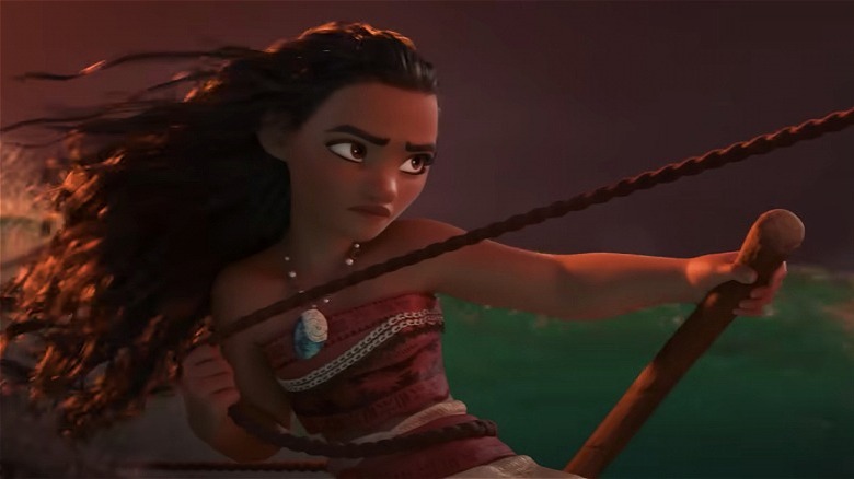 Moana sailing over a wave