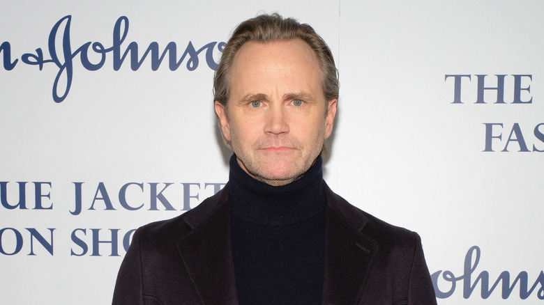 Lee Tergesen wearing a thick black turtleneck sweater