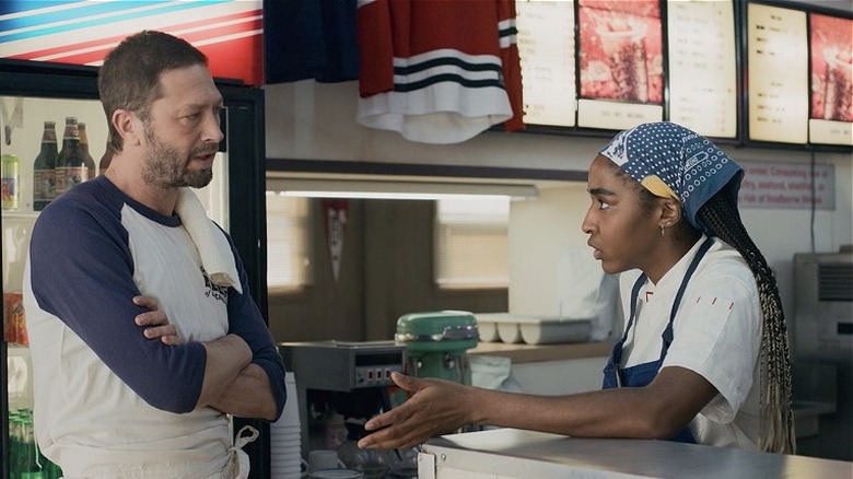 Richie and Sydney arguing at the counter