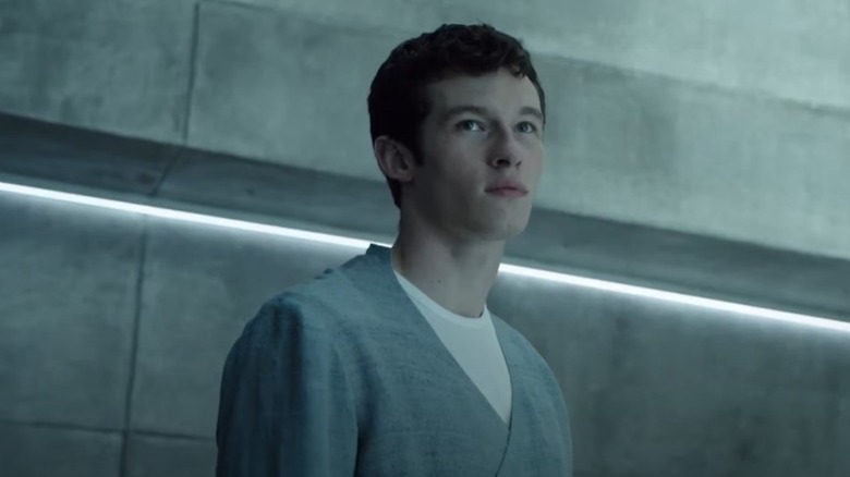 Callum Turner staring