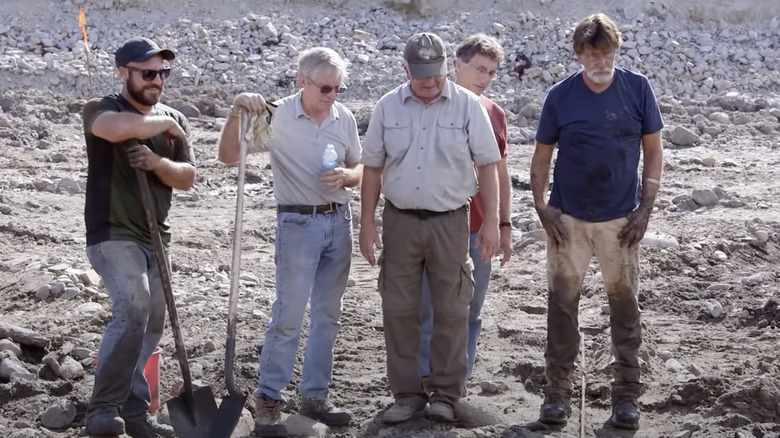 Curse of Oak Island crew standing around