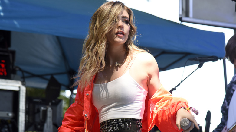 Chrissy Costanza performs at a concert