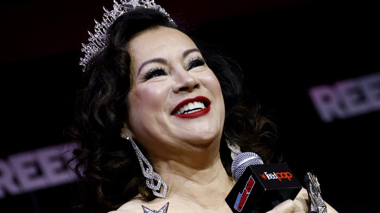 Jennifer Tilly smiling with tiara