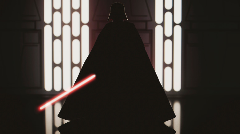 Darth Vader with red lightsaber extended