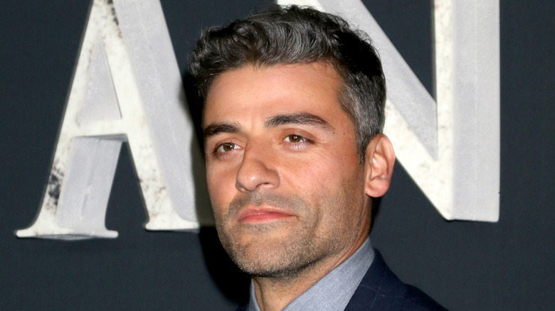 Oscar Isaac looking wistfully off-screen