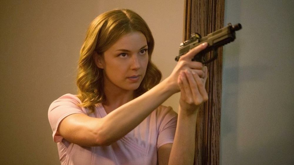 Sharon Carter pointing gun