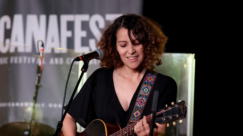 Gaby Moreno playing guitar