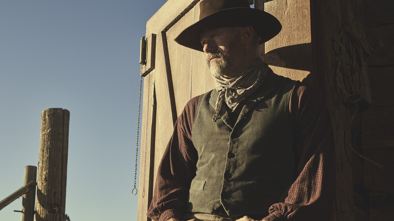 James Badge Dale as John Dutton Senior standing in doorway