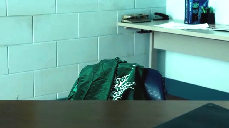 Tommy Oliver's green jacket on a chair