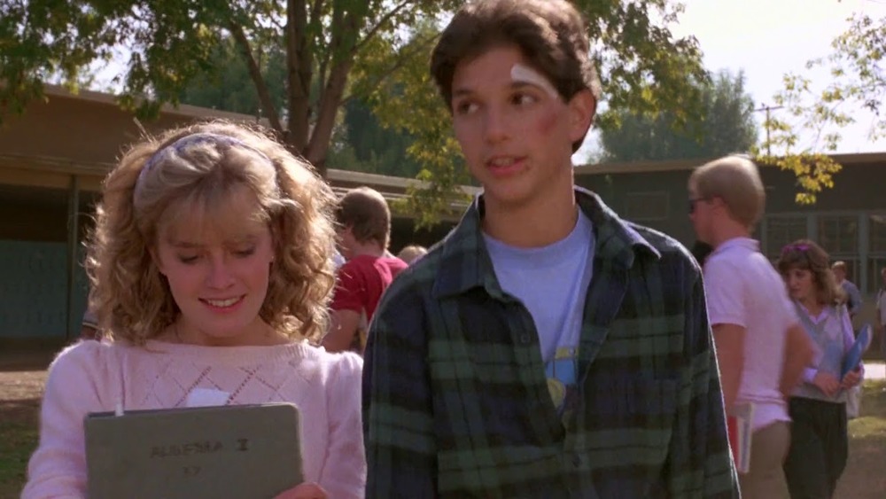 Ralph Macchio as Daniel LaRusso and Elisabeth Shue as Ali Mills in The Karate Kid