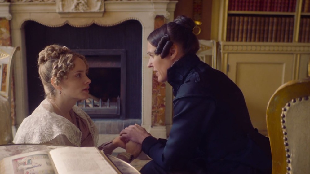 Sophie Rundle holds Suranne Jones' hands