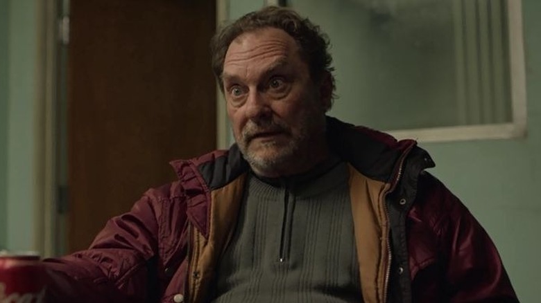 Stephen Root wearing red jacket in Barry
