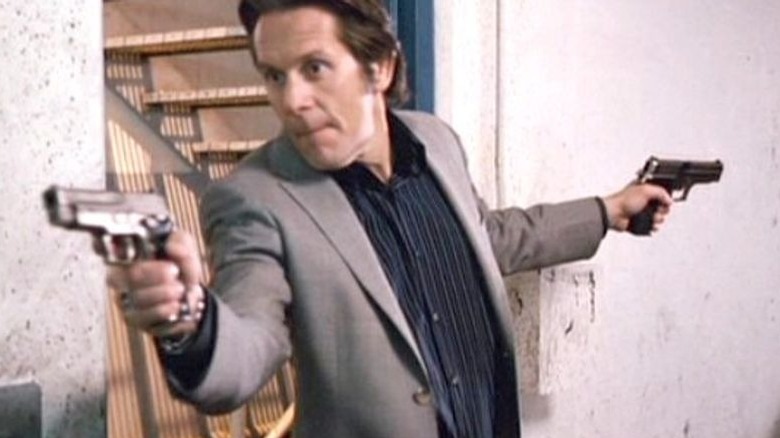 gary cole as ted jones pointing guns