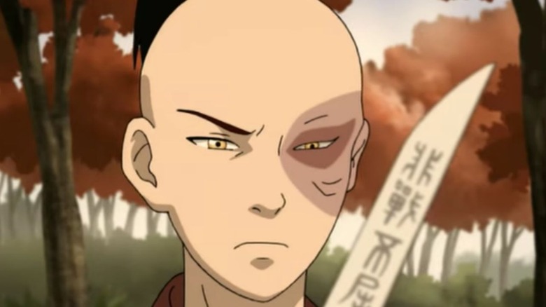 Zuko holding a knife