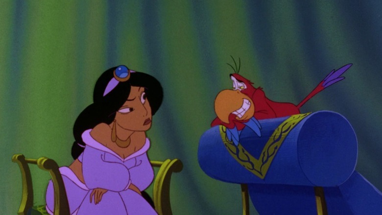 Iago grinning at an unimpressed Jasmine