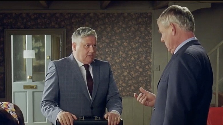 Doc Martin looking scathing at Dr. Edward Mullen