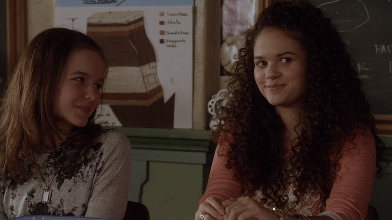 Madison Pettis smirking in classroom in The Fosters