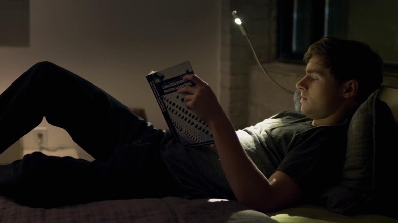 Alex reading in bed