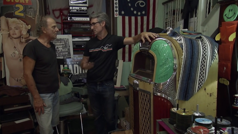 Mike standing beside the jukebox