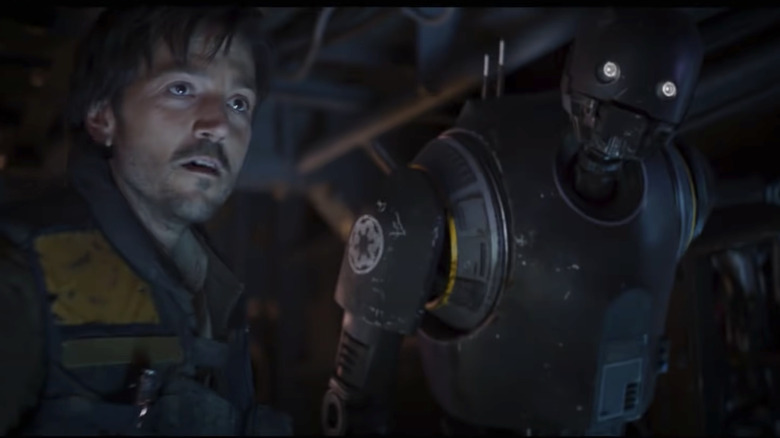 Cassian Andor and droid K-2SO appearing in Rogue One: A Star Wars Story