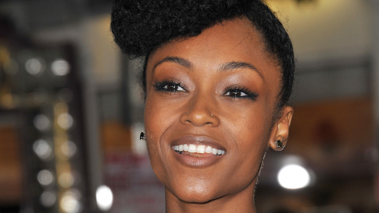 Yaya DaCosta smiling