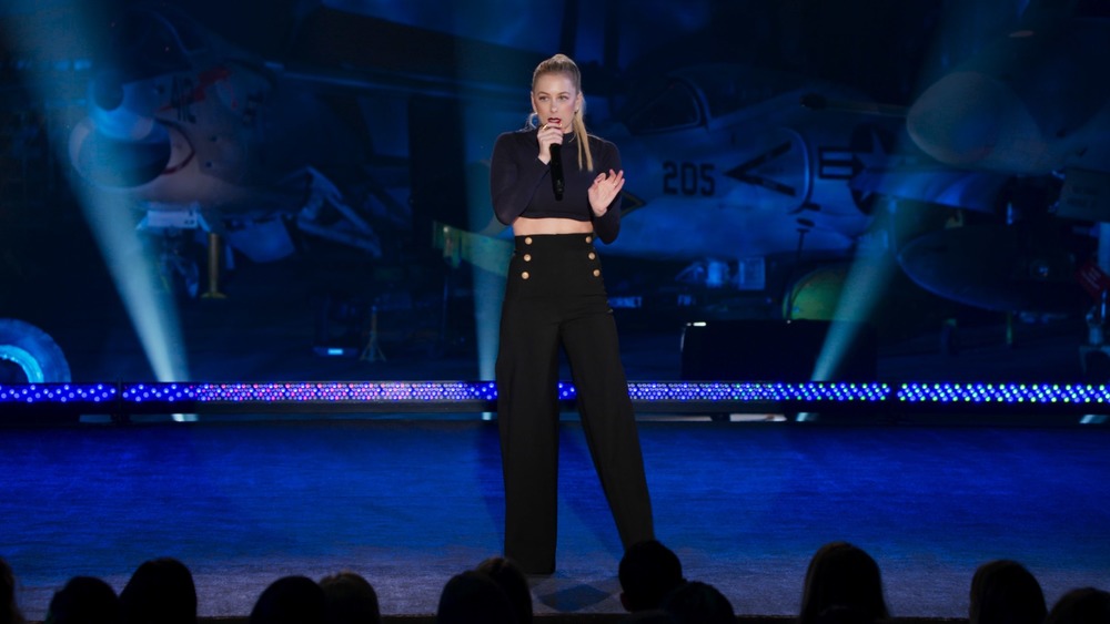 Iliza Shlesinger performs onstage in Elder Millennial 