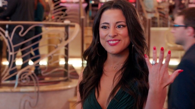 Carmela Zumbado showing ring on "Crazy Ex-Girlfriend"