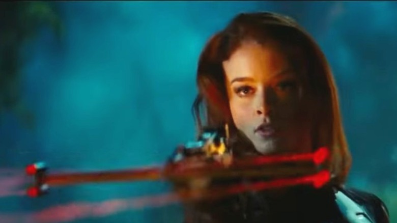 Scarlett firing a crossbow in G.I. Joe: The Rise of Cobra