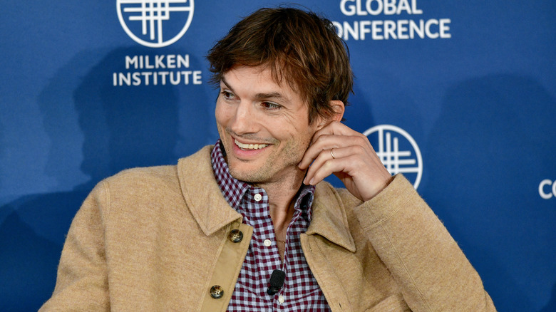 Ashton Kutcher smiles