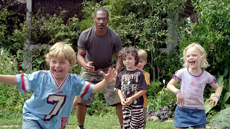 Eddie Murphy and Elle Fanning (far right) in "Daddy Day Care"