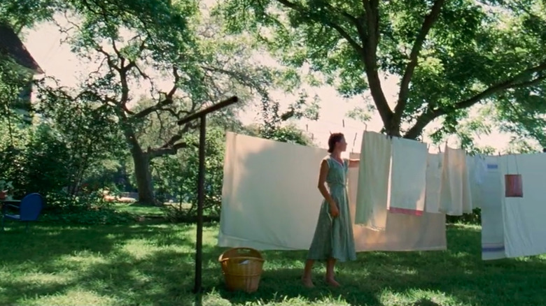 Woman hanging clothes on line