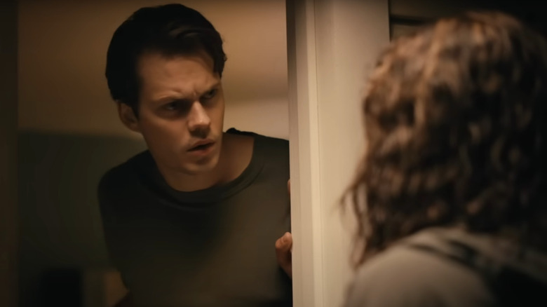 Skarsgard answers the door in Barbarian