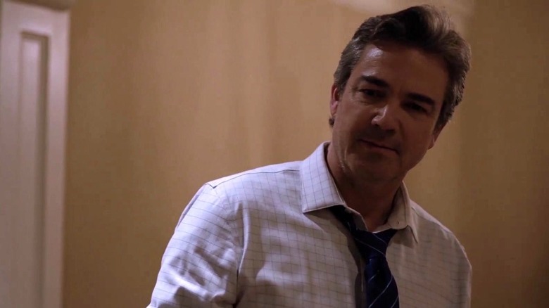 Jon Tenney looks beleaguered 