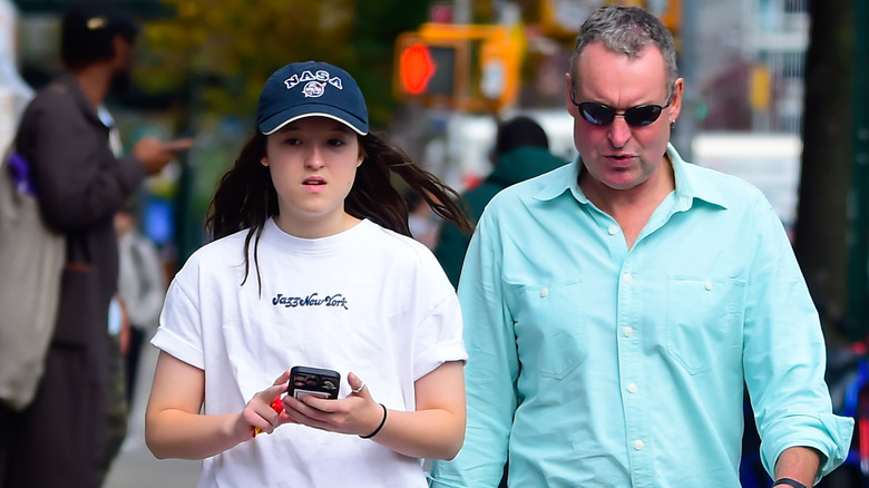 Bella Ramsey walking in Soho