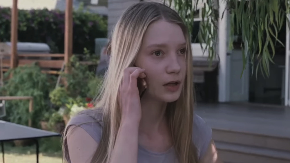 Mia Wasikowska on phone