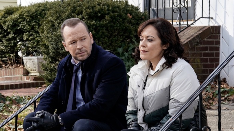 Danny talks with Baez on stoop in Blue Bloods