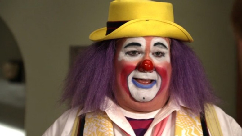 Eric Stonestreet dressed as a clown 