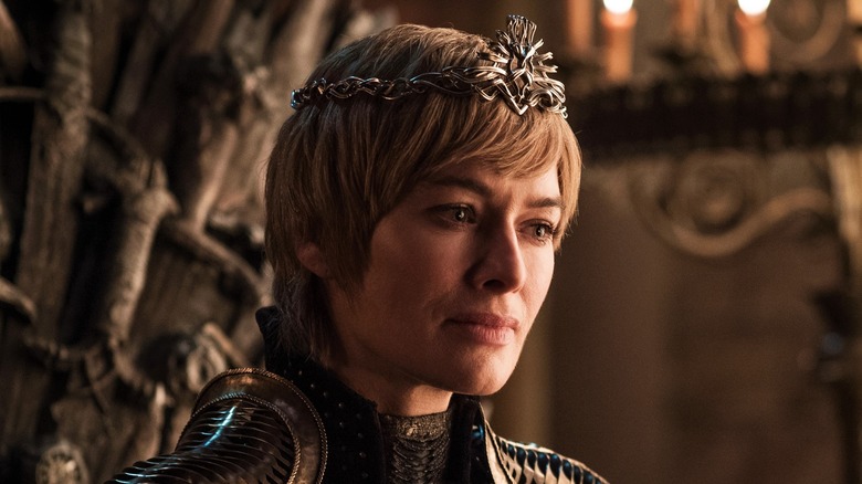 Cersei Lannister as queen sitting on Iron Throne