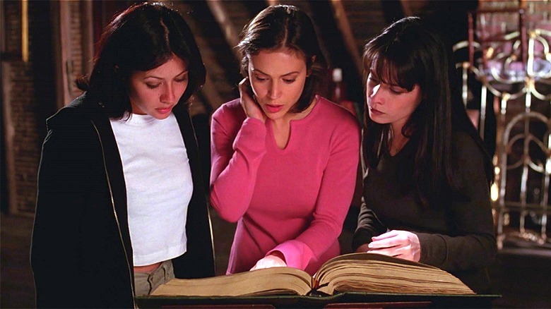 Phoebe, Prue, and Piper reading