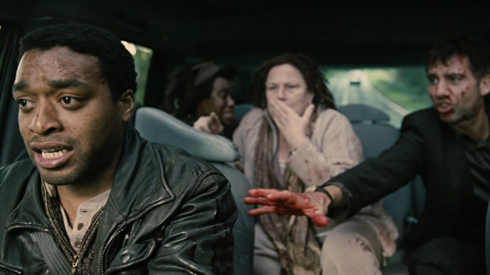Chiwetel Ejiofor as Luke, driving the car in Children of Men